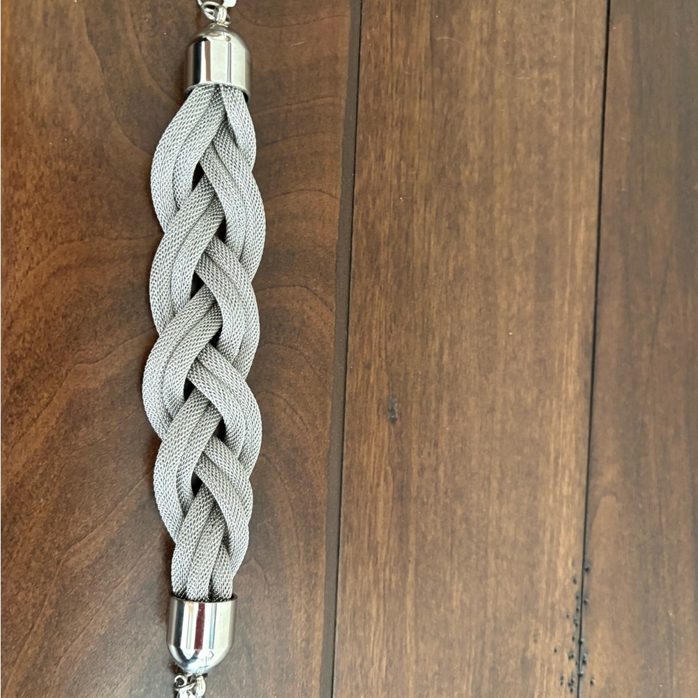Silver Braided Bracelet- never worn a little art of the tag still on.